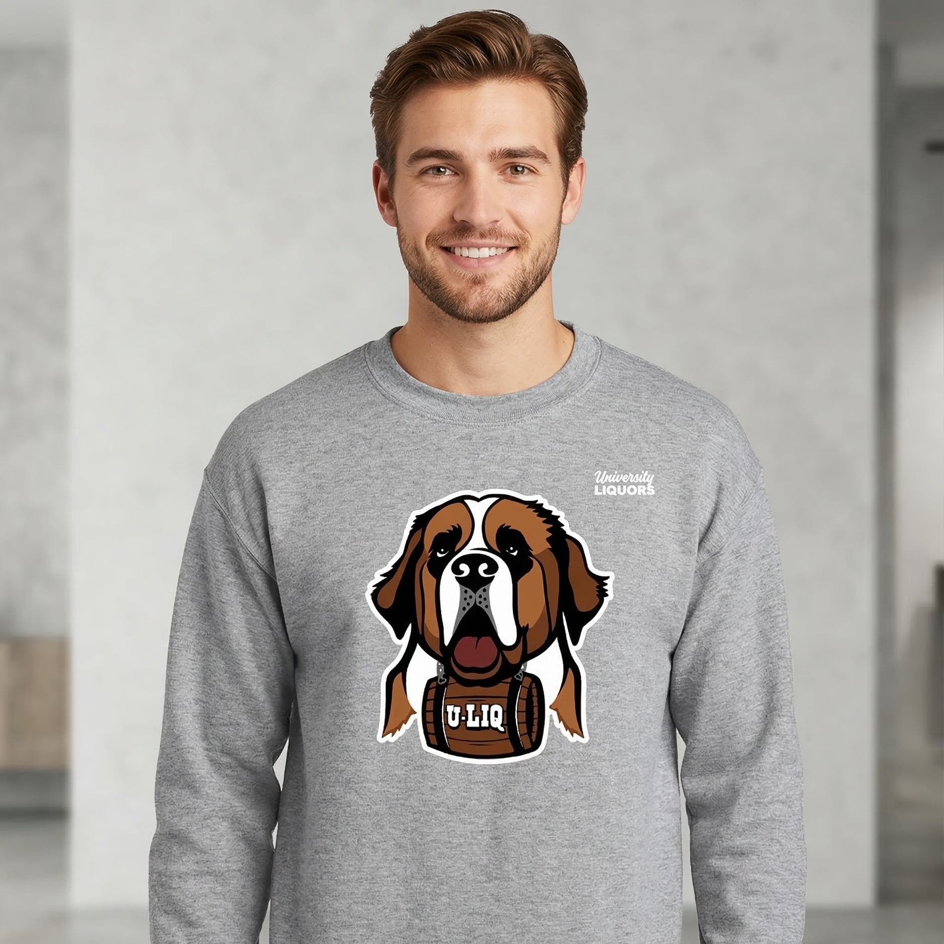 Man wearing a gray University Liquors sweatshirt