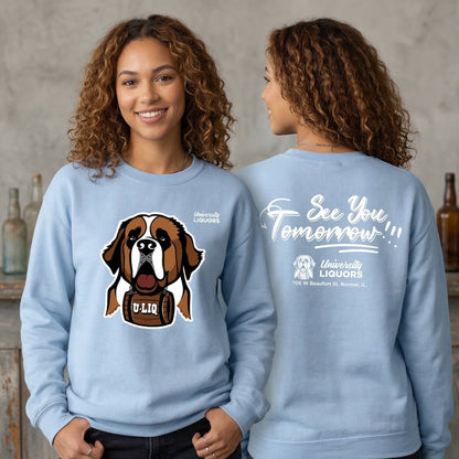 Person wearing a light blue University Liquors sweatshirts, standing against a neutral background.