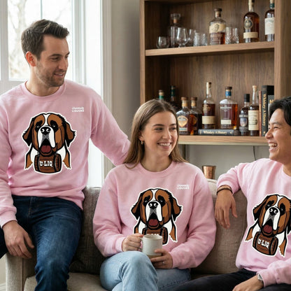 Three people sitting on a couch wearing light pink University Liquors sweatshirt, in a room with a bookshelf of bottles.