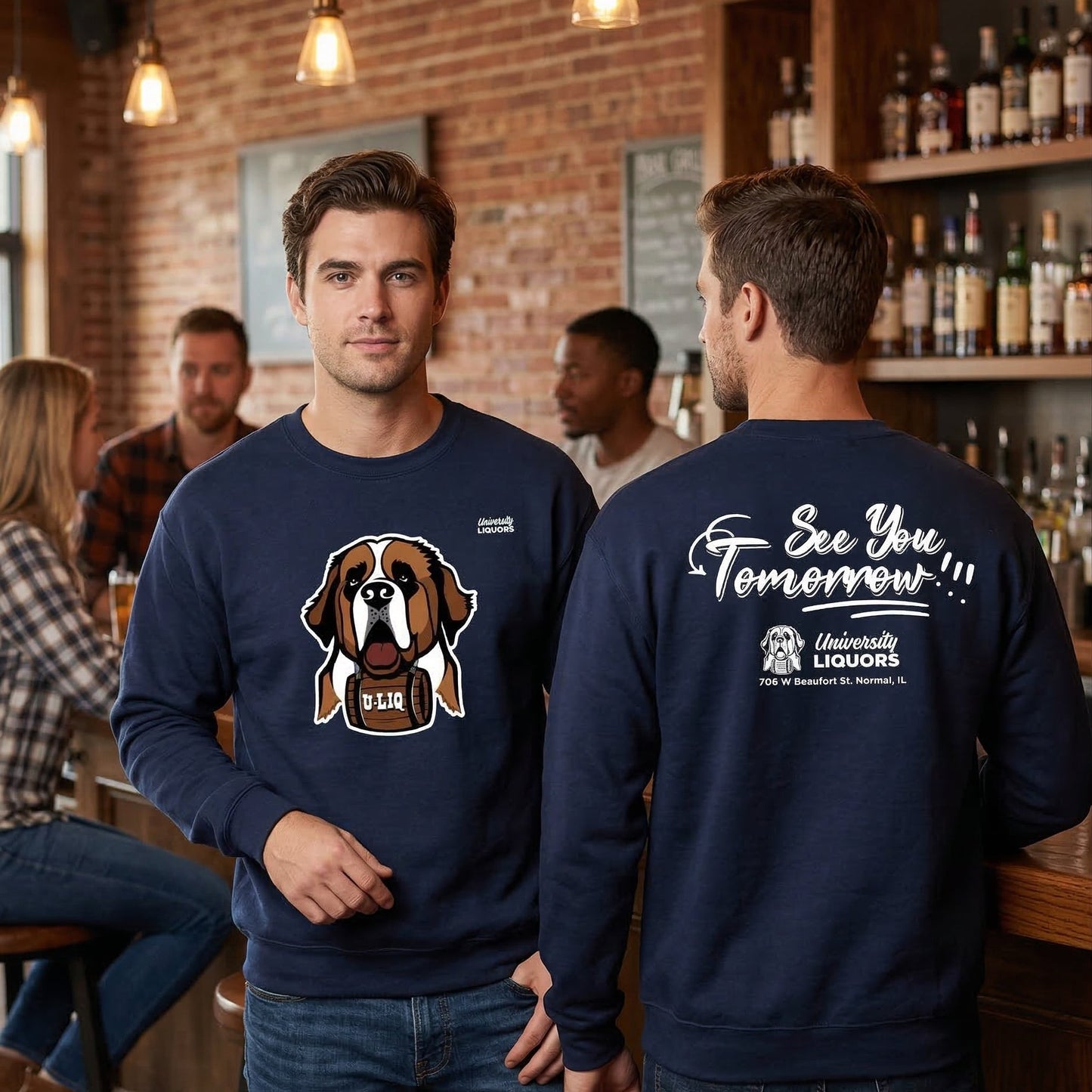 Two men wearing navy blue University Liquors sweatshirts in a bar setting.