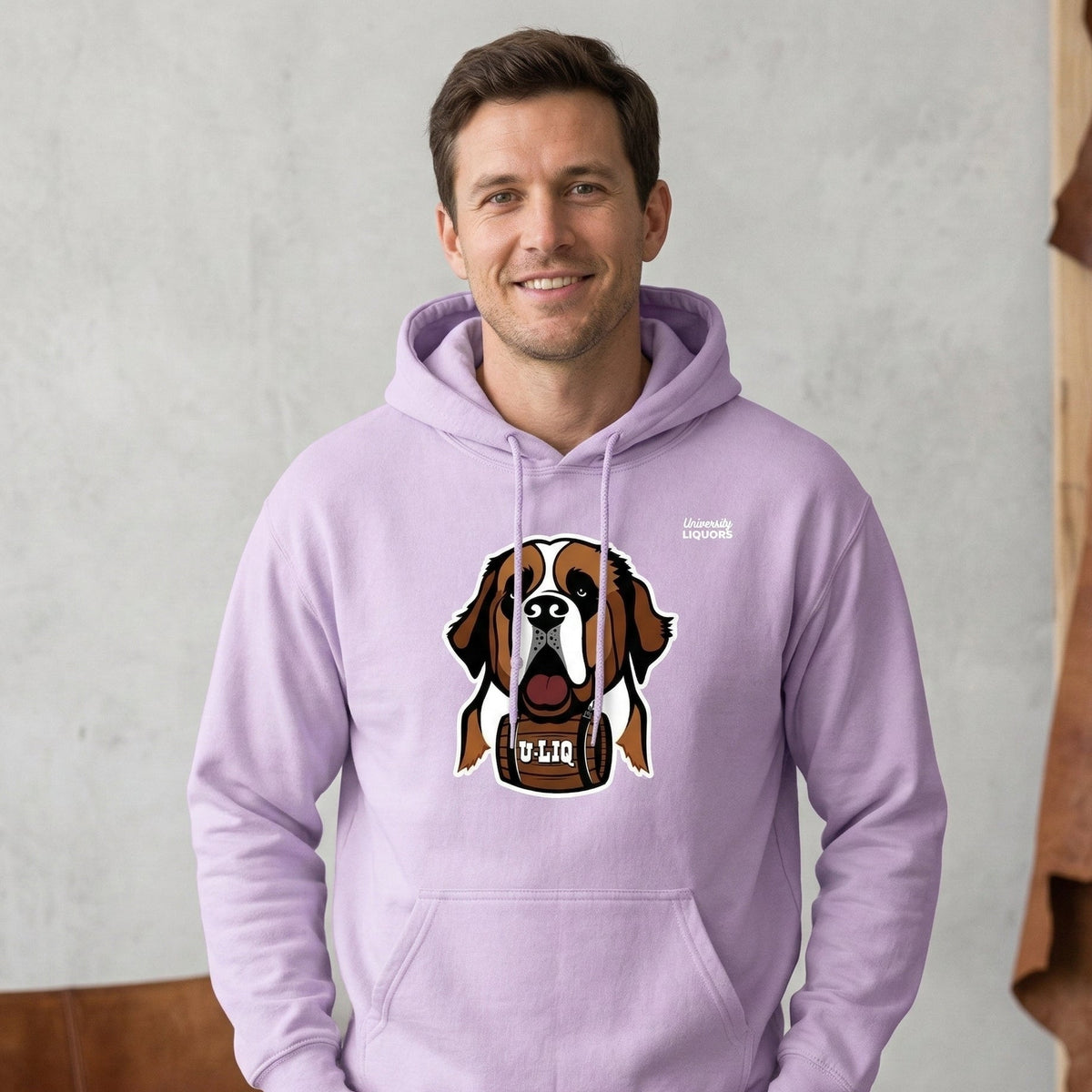 Man wearing a purple University Liquors hoodie.